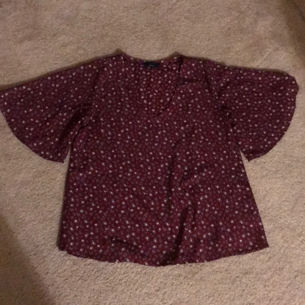 Red patterned blouse